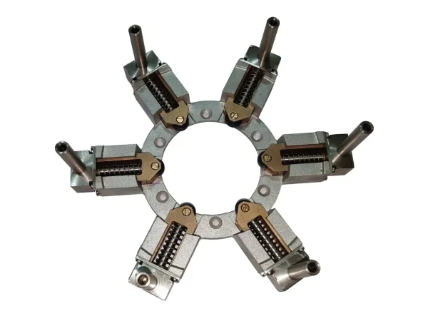 Mechanismus gripper válce pro označování pro plnicí a balicí systémy